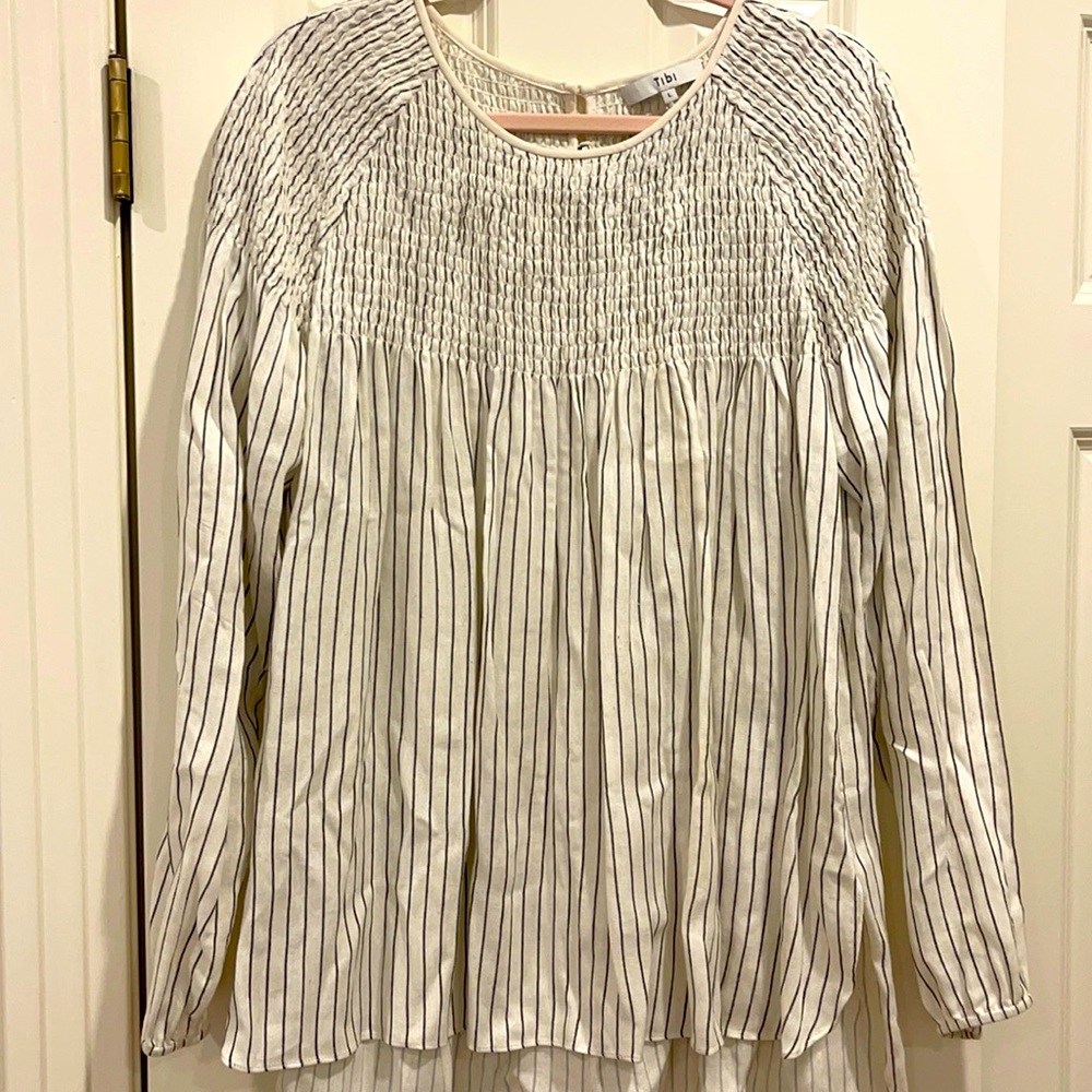 Smocked long sleeve blouse by Tibi! Pretty details